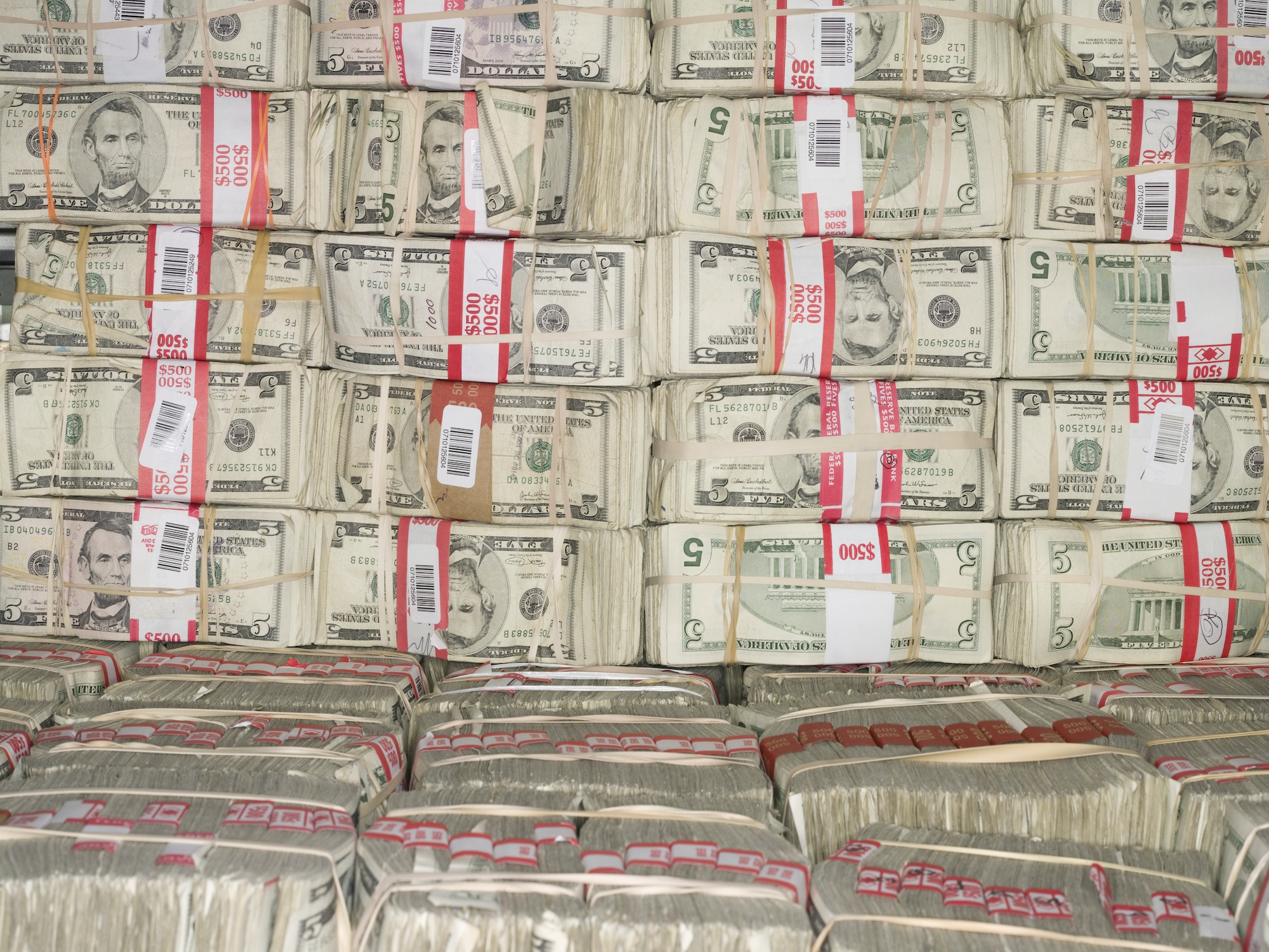 Bundles of Five Dollar Bills