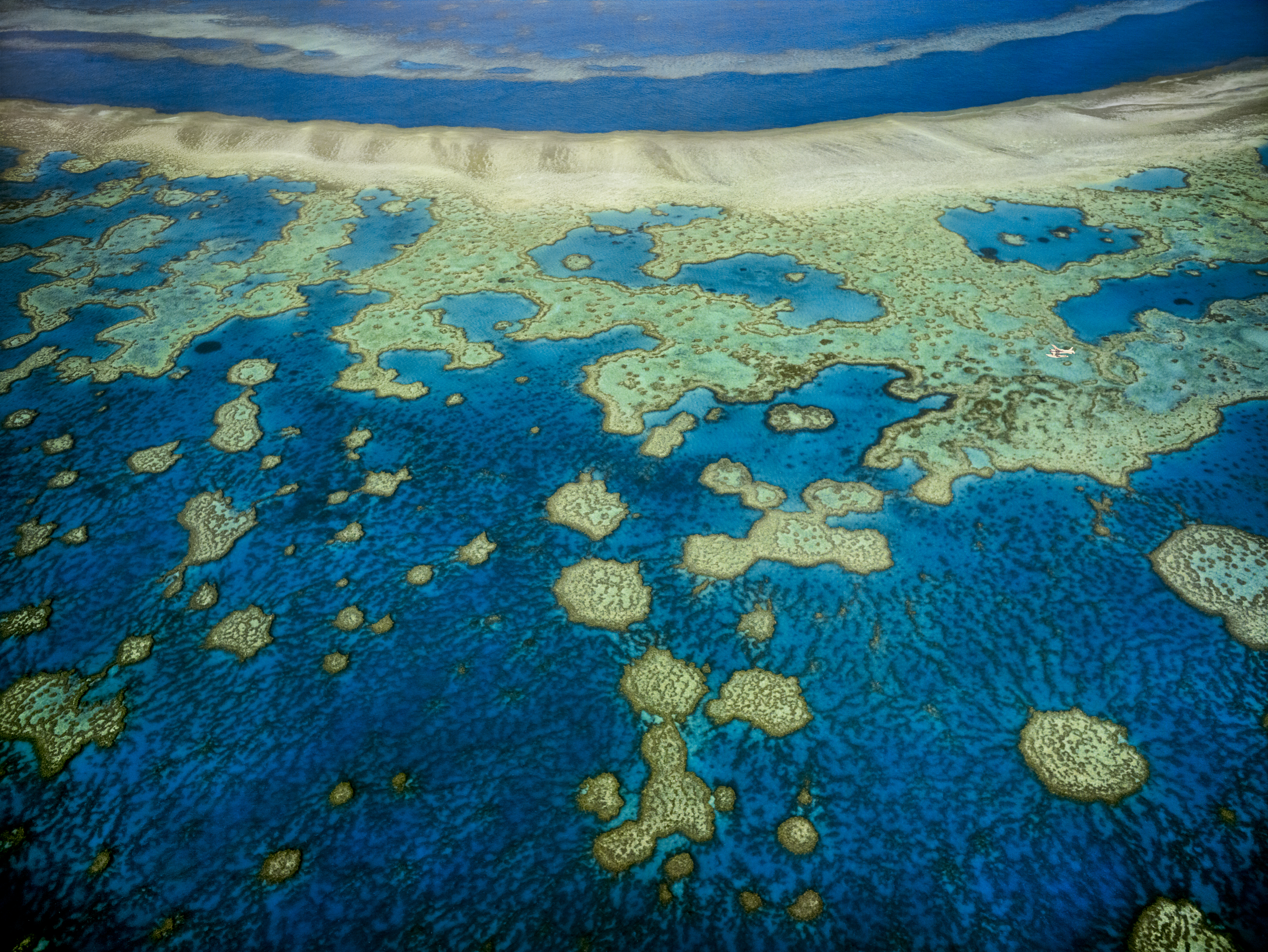 An aerial view of the islands of the Great Barrier Reef in Queensland, Australia