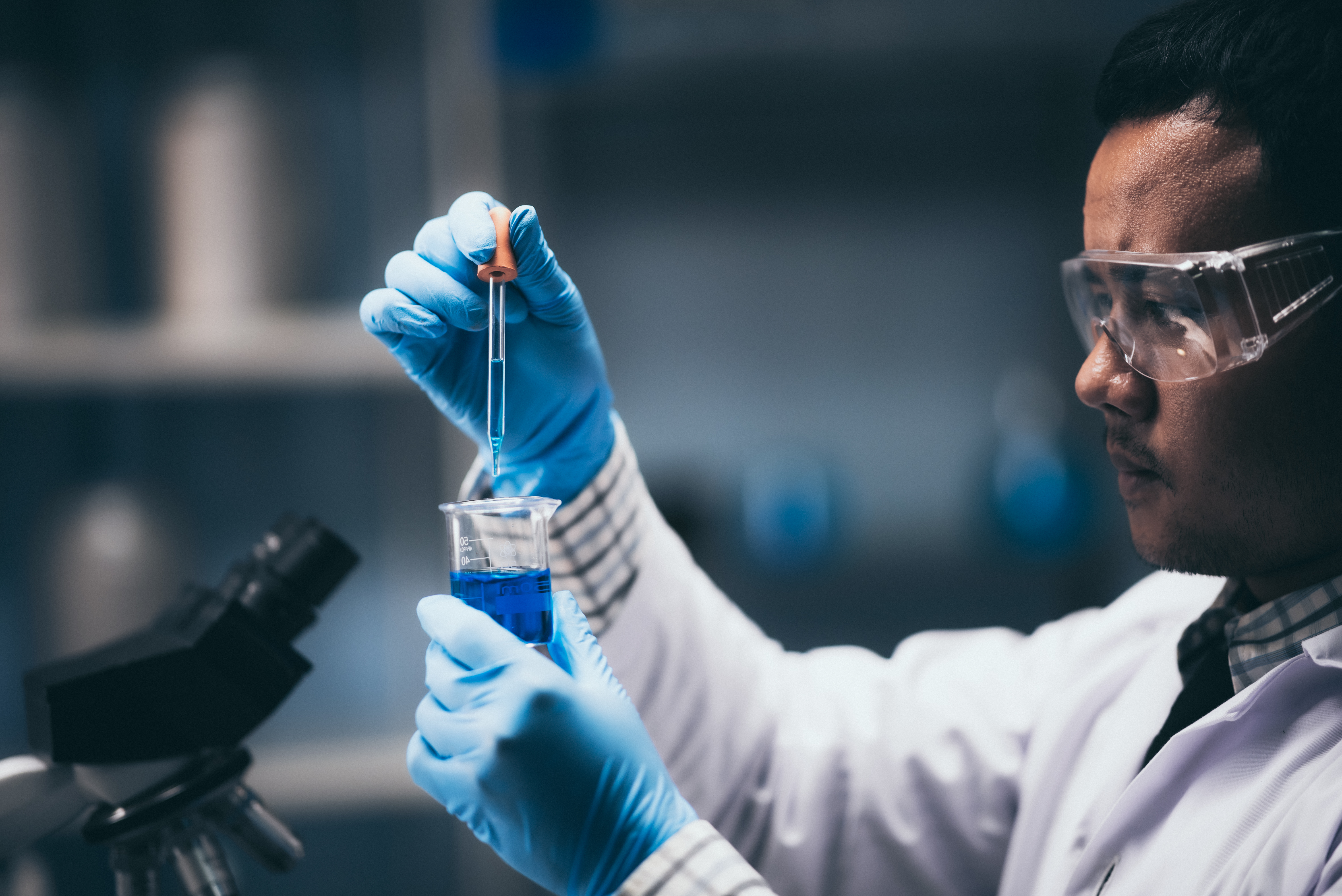 researchers are studying chemistry in the laboratory.