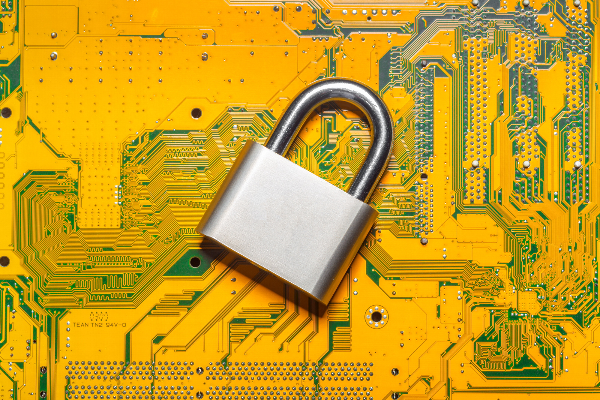 padlock on a computer circuit board